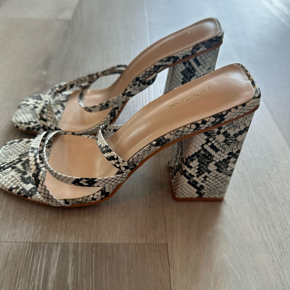 Pretty little thing- snake mules in size 7
